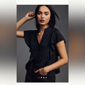 Anthropologie flutter top. Black. Size L.